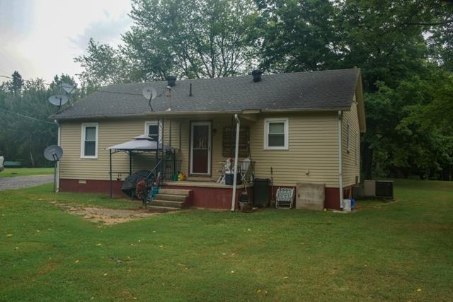 5124 Pineywoods Road Adams, TN 37010 - Photo 16 of 20 Rear view of home has covered back porch.