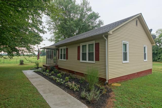 5124 Pineywoods Road Adams, TN 37010 - Photo 18 of 20 Great landscaping & sidewalk.