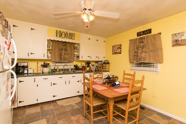 5124 Pineywoods Road Adams, TN 37010 - Photo 7 of 20 Kitchen has been freshly painted & provides newly tiled floors.