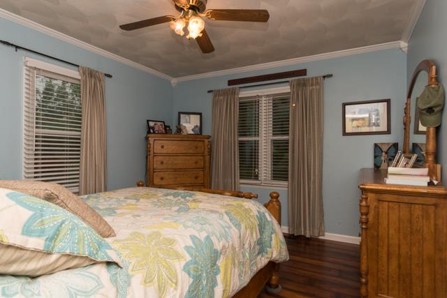 5124 Pineywoods Road Adams, TN 37010 - Photo 8 of 20 Master bedroom with crown molding, 2 lg windows & ceiling fan.