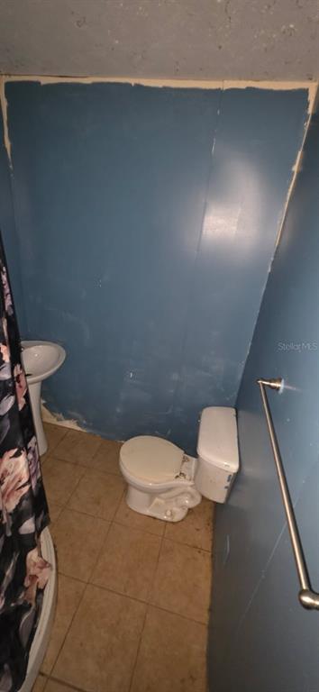 305 16th Avenue Ocoee, FL 34761 - Photo 16 of 20 a bathroom with a toilet