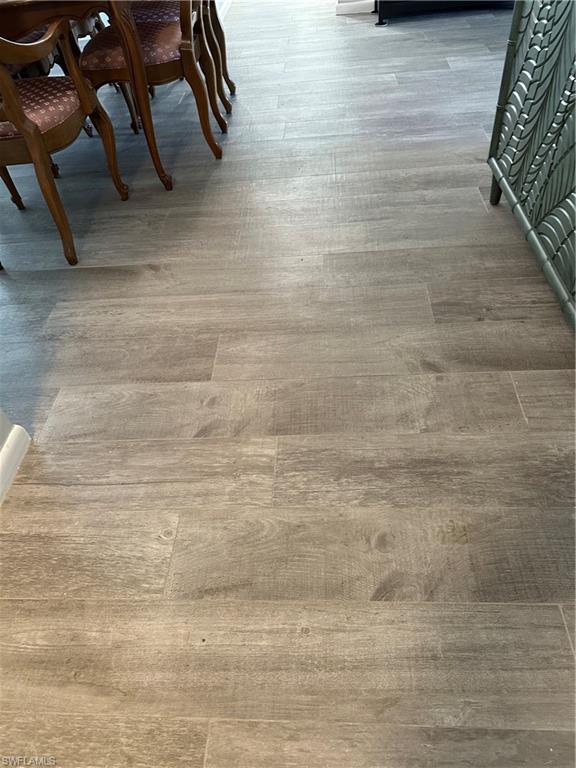 231 Memory Lane, Unit 3 Naples, FL 34112 - Photo 19 of 27 a bathroom with a shower