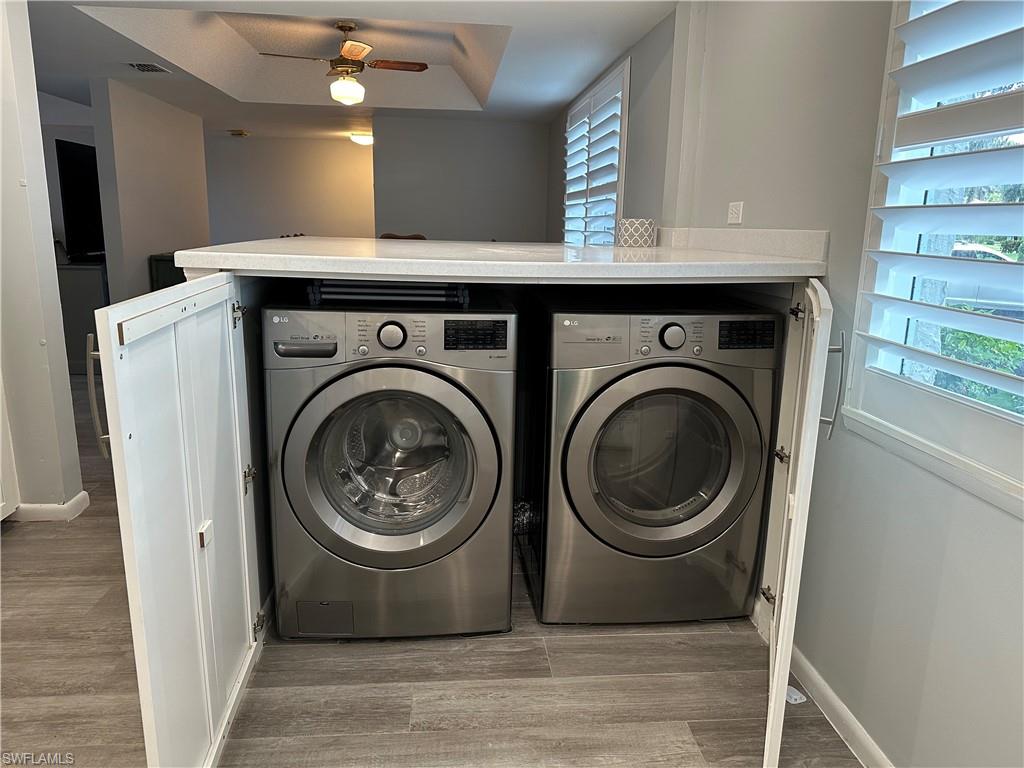 231 Memory Lane, Unit 3 Naples, FL 34112 - Photo 7 of 27 a view of a utility room with washer and dryer