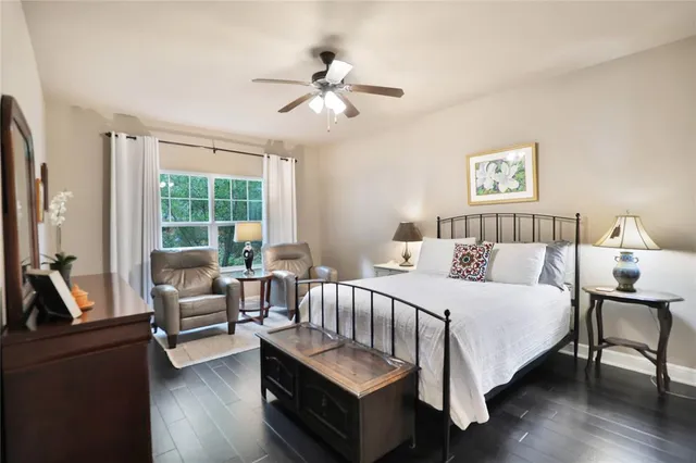 a bedroom with a bed and a couch