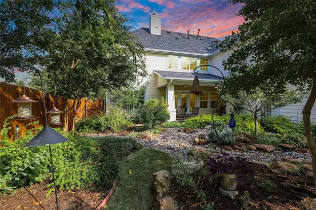 a view of a house with a garden