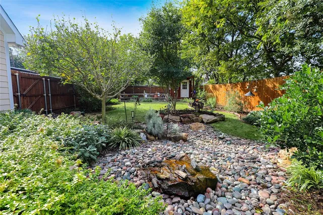 an aerial view of a house with a garden