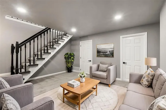 a living room with furniture or stairs and a couch