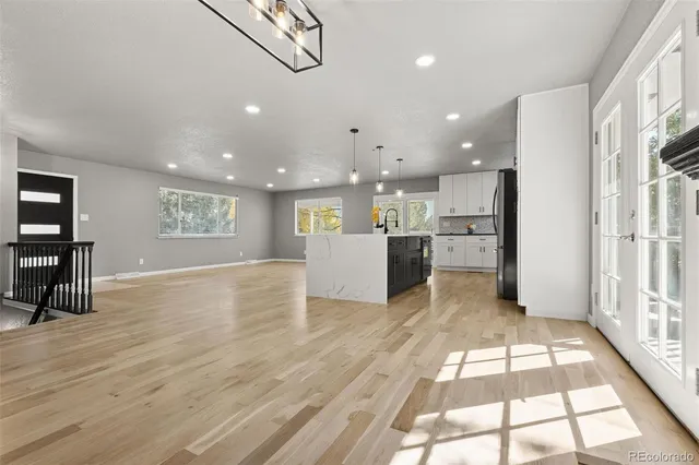 a view of a kitchen with furniture and a window