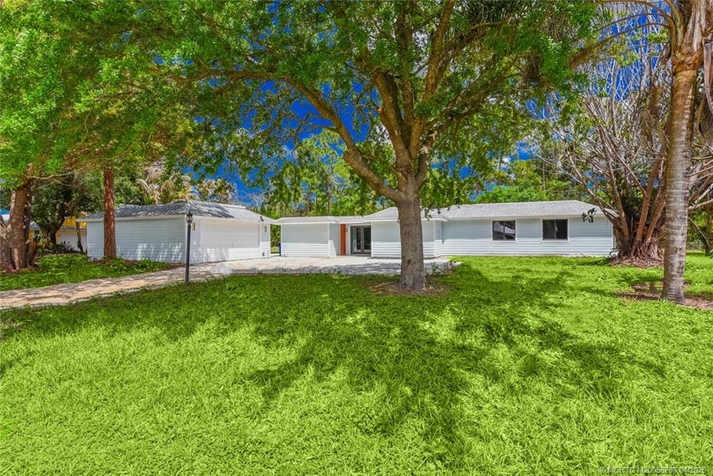 8587 Southwest 18th Avenue Stuart, FL 34997 - Photo 1 of 39