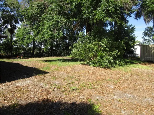 a view of outdoor space and yard