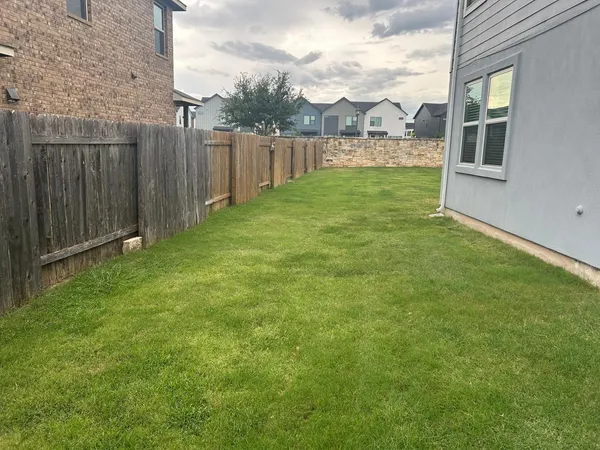a view of a garden with a big yard