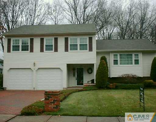 36 Meredith Road Piscataway, NJ 08854 - Photo 1 of 8 a view of a house with a yard