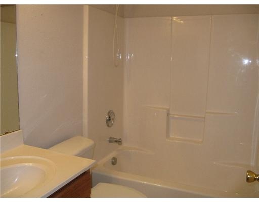 1211 Sacramento Street Portland, TX 78374 - Photo 4 of 5 a bathroom with a bathtub