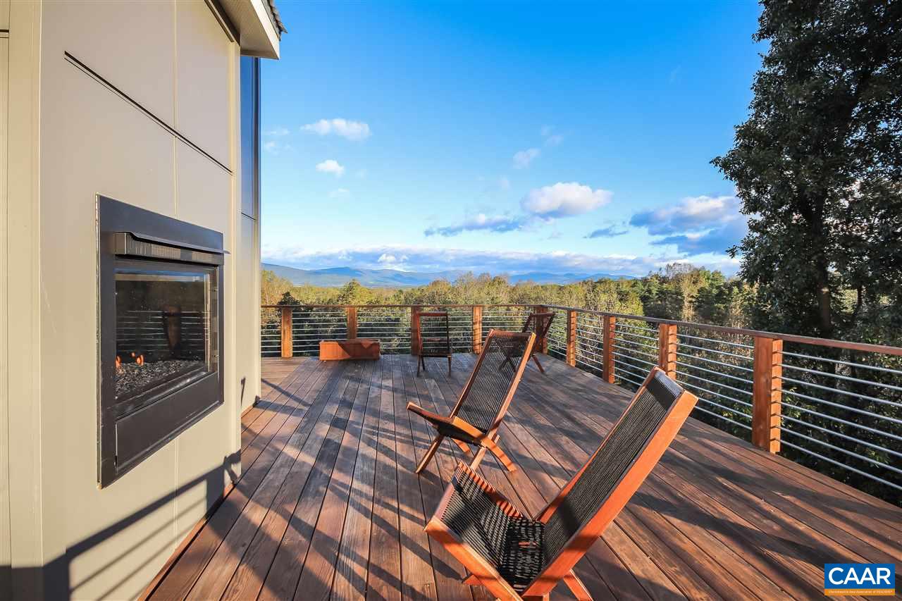 844 Dry Bridge Road Charlottesville, VA 22903 - Photo 46 of 49 a view of a balcony with chairs