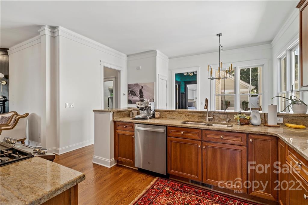 365 Third Baxter Street, Unit 568 Fort Mill, SC 29708 - Photo 10 of 40 a kitchen with stainless steel appliances granite countertop a sink stove and refrigerator