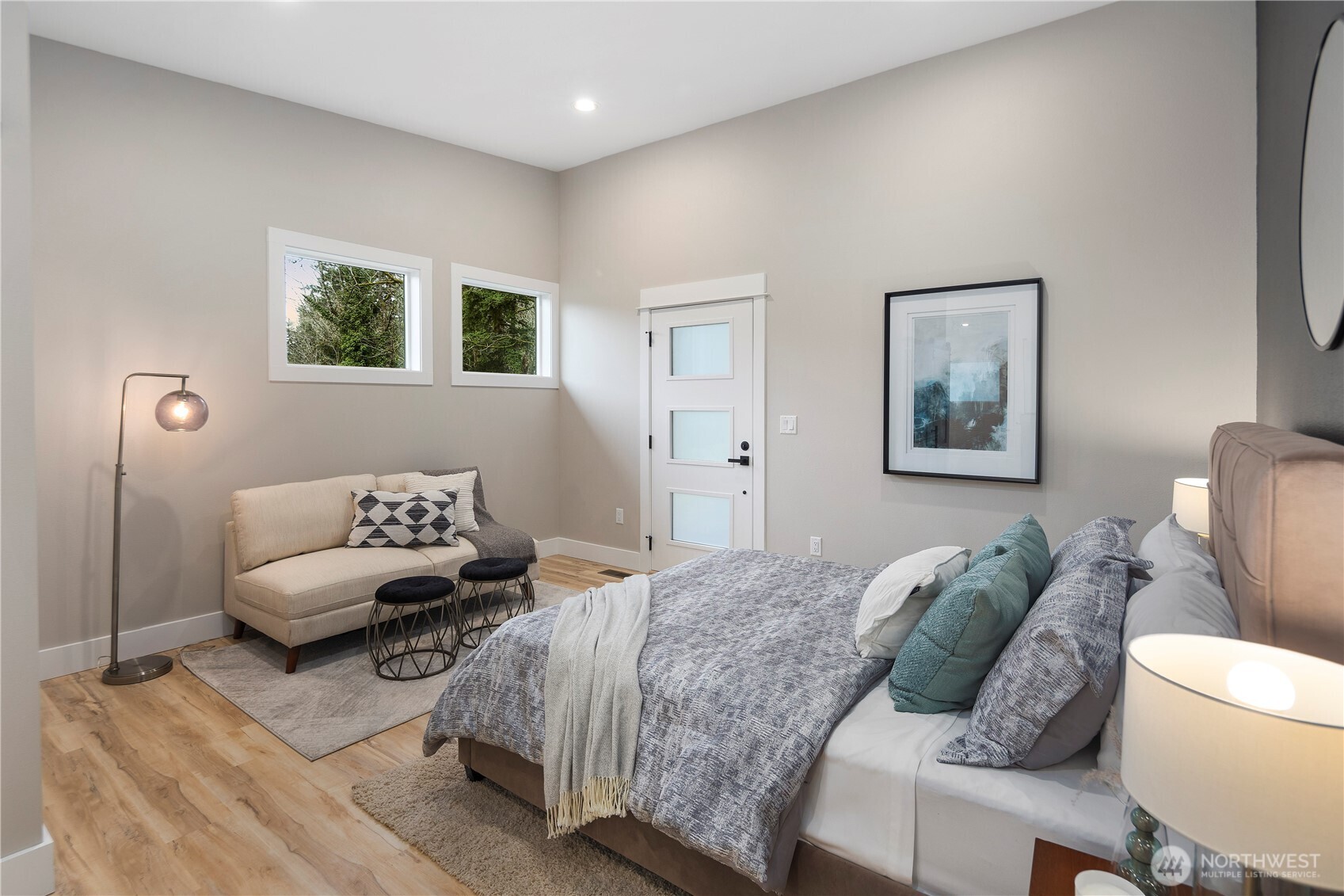 16250 Southeast Lake Moneysmith Road Auburn, WA 98092 - Photo 19 of 40 a bedroom with a bed and a couch