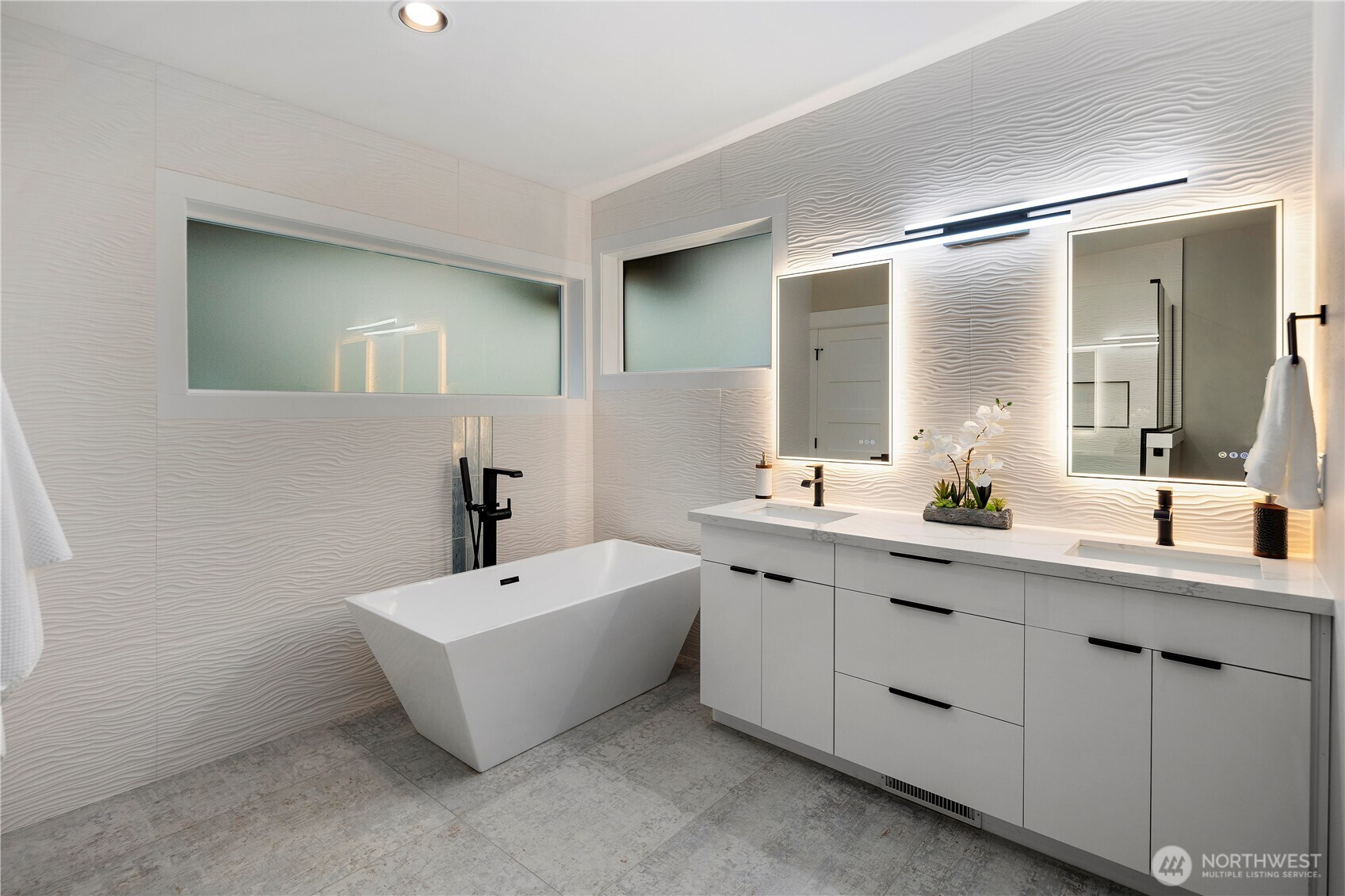 16250 Southeast Lake Moneysmith Road Auburn, WA 98092 - Photo 23 of 40 a bathroom with a double vanity sink mirror and bathtub