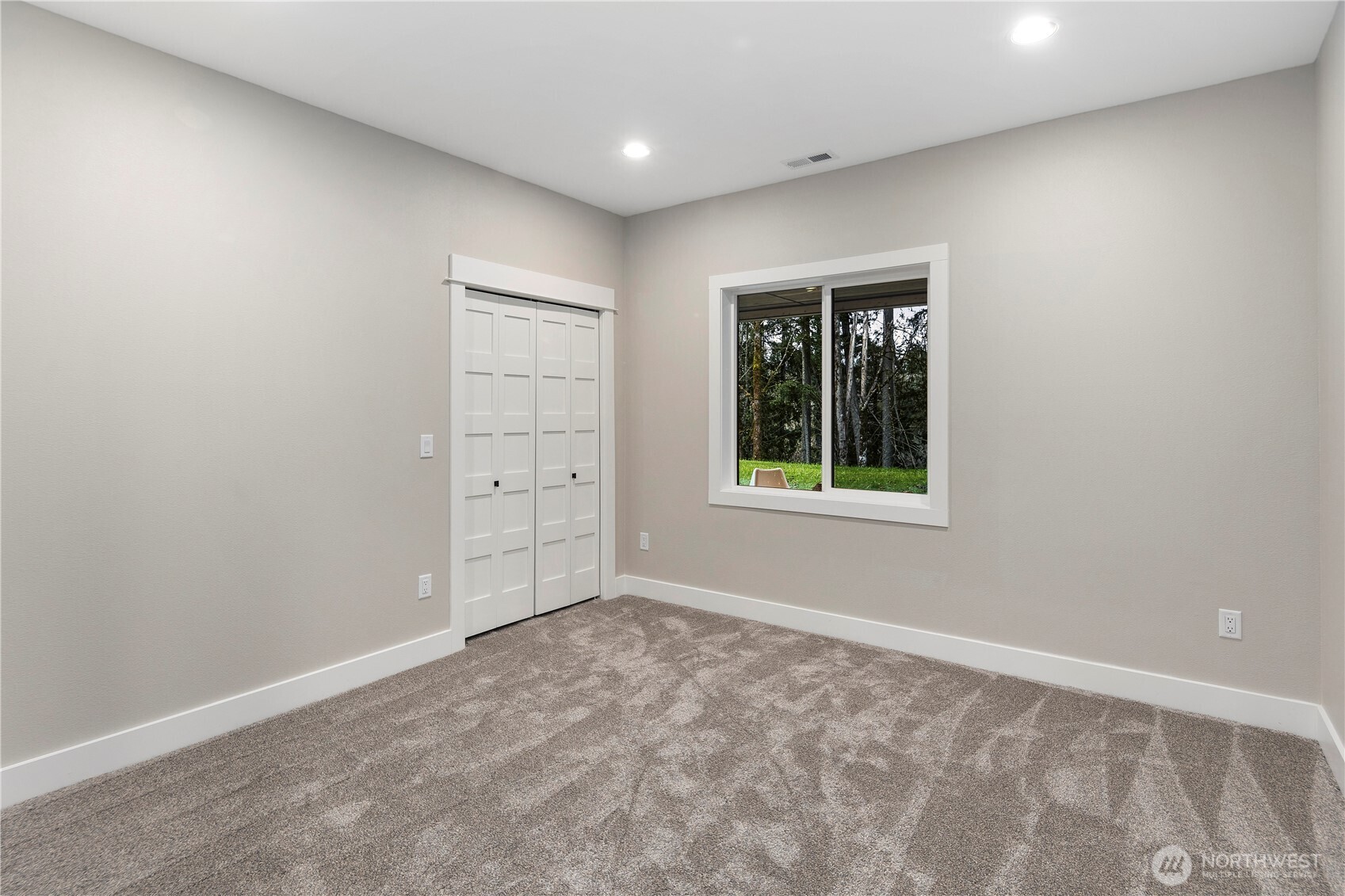 16250 Southeast Lake Moneysmith Road Auburn, WA 98092 - Photo 28 of 40 an empty room with windows