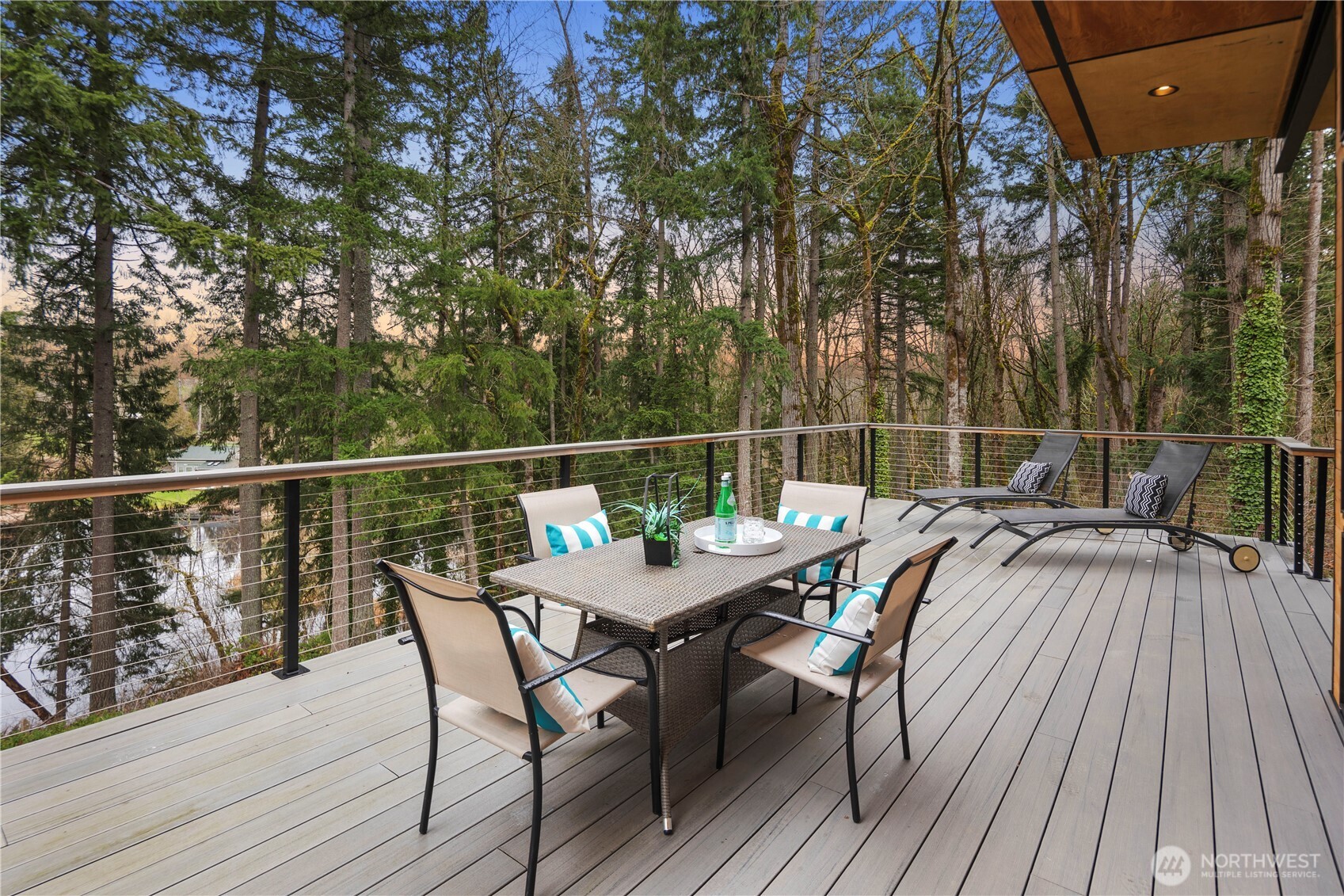 16250 Southeast Lake Moneysmith Road Auburn, WA 98092 - Photo 31 of 40 a balcony with wooden floor table and chairs
