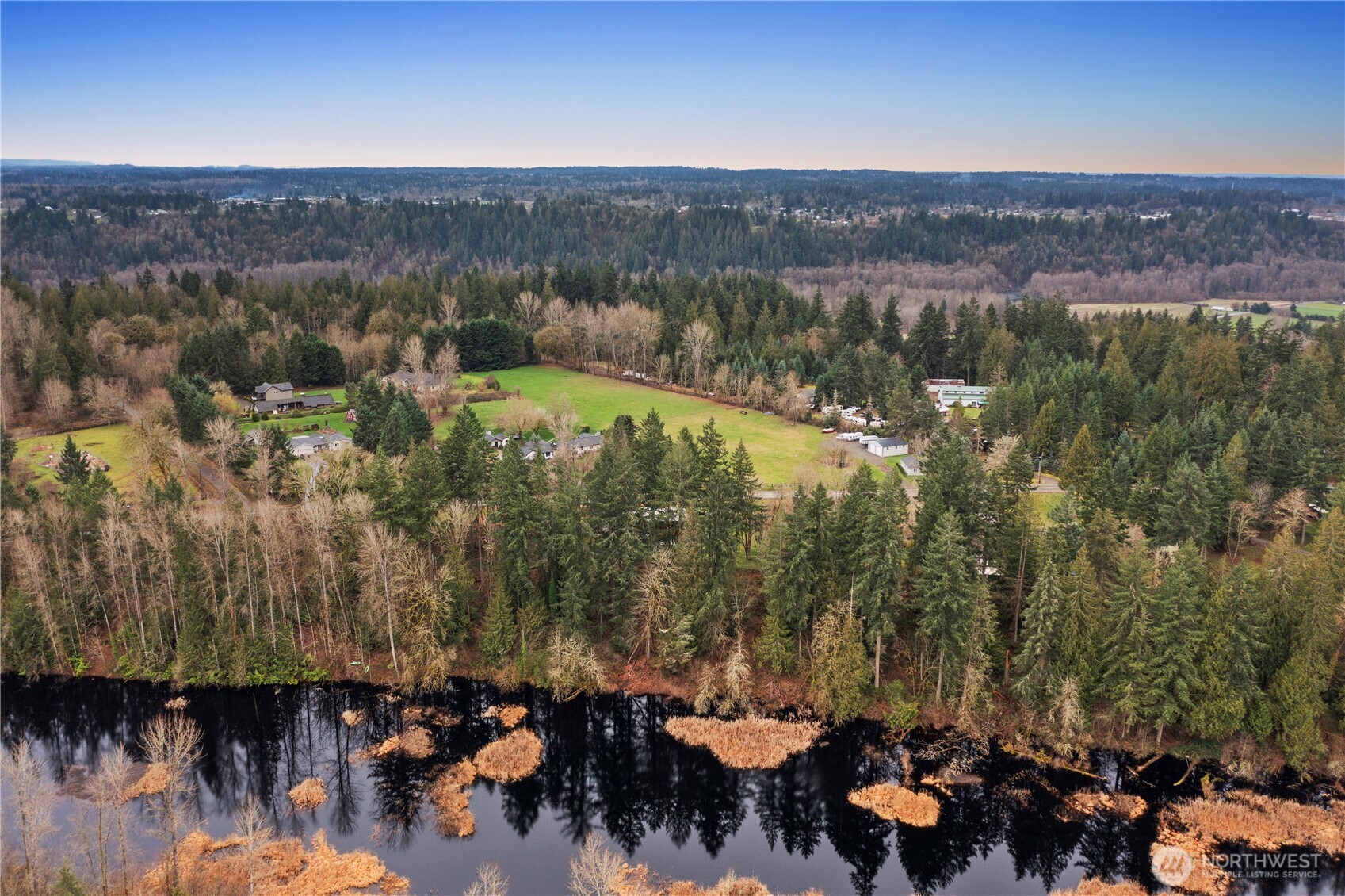 16250 Southeast Lake Moneysmith Road Auburn, WA 98092 - Photo 37 of 40 an aerial view of a city with lots of residential buildings and mountain view in back