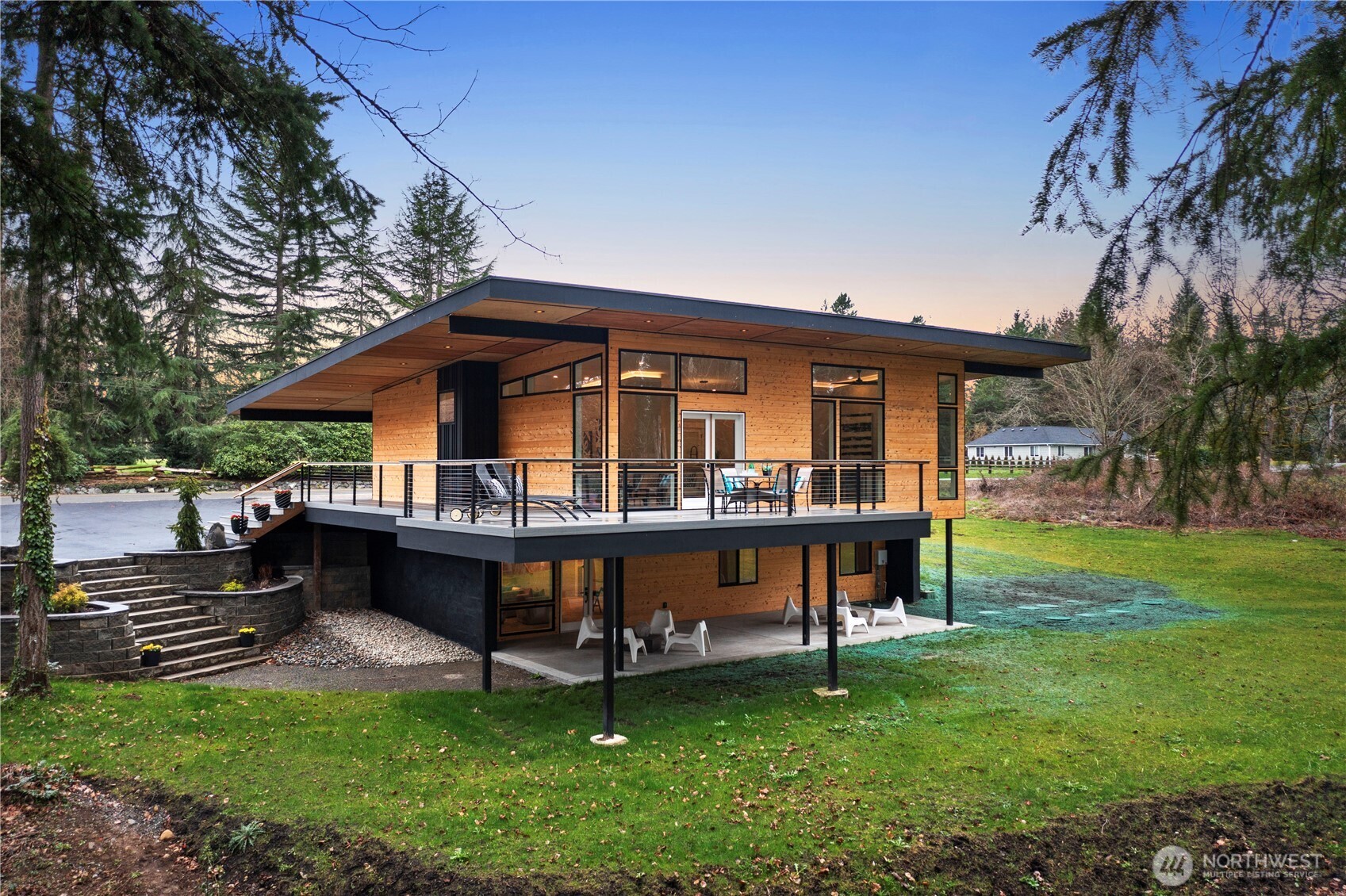 16250 Southeast Lake Moneysmith Road Auburn, WA 98092 - Photo 38 of 40 a view of a house with a yard porch and sitting area
