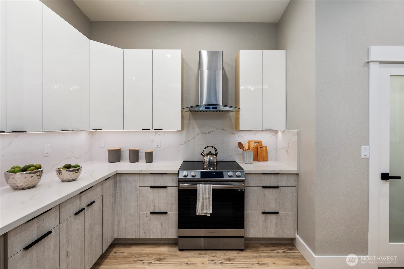 16250 Southeast Lake Moneysmith Road Auburn, WA 98092 - Photo 9 of 40 a kitchen with stainless steel appliances granite countertop a sink a stove and cabinets