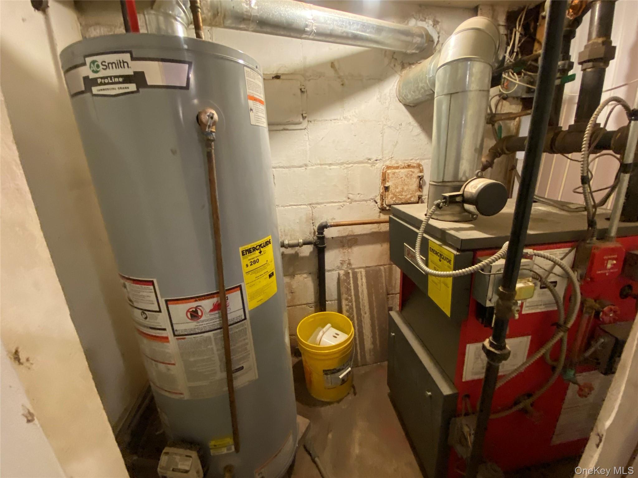 24 Lent Avenue Hempstead, NY 11550 - Photo 12 of 14 a bathroom with a toilet and a shower