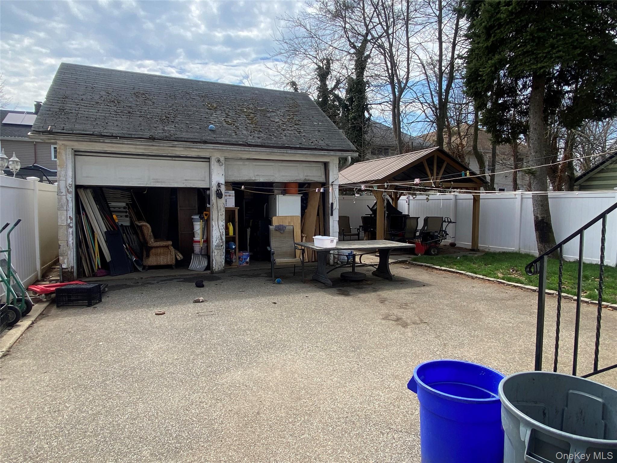 24 Lent Avenue Hempstead, NY 11550 - Photo 10 of 14 a view of a house with a sink and a yard