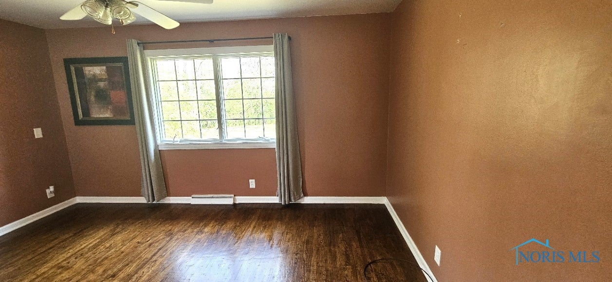 7710 Noward Road Waterville, OH 43566 - Photo 30 of 42 primary bedroom w/original wood floors