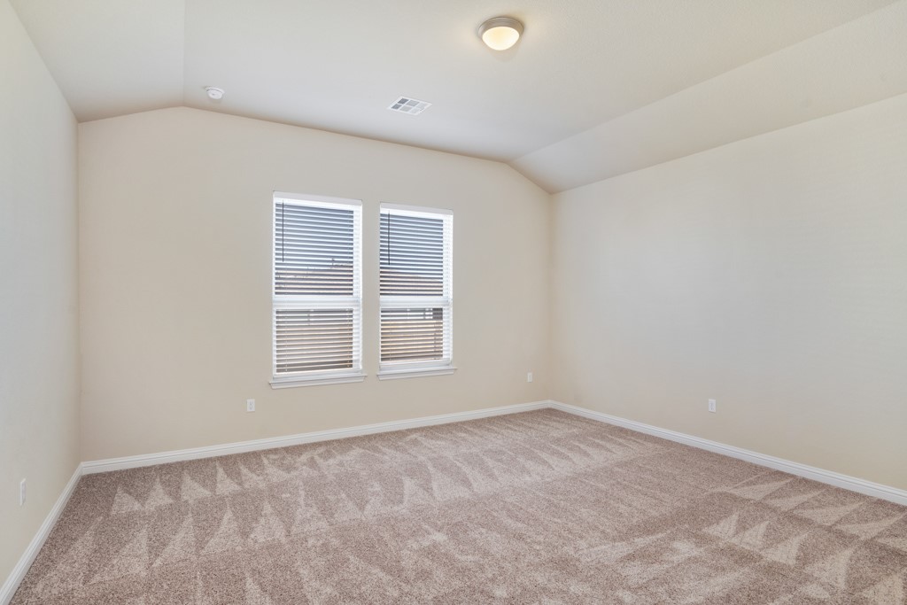 8202 Dampton Lane Austin, TX 78744 - Photo 12 of 25 an empty room with a window