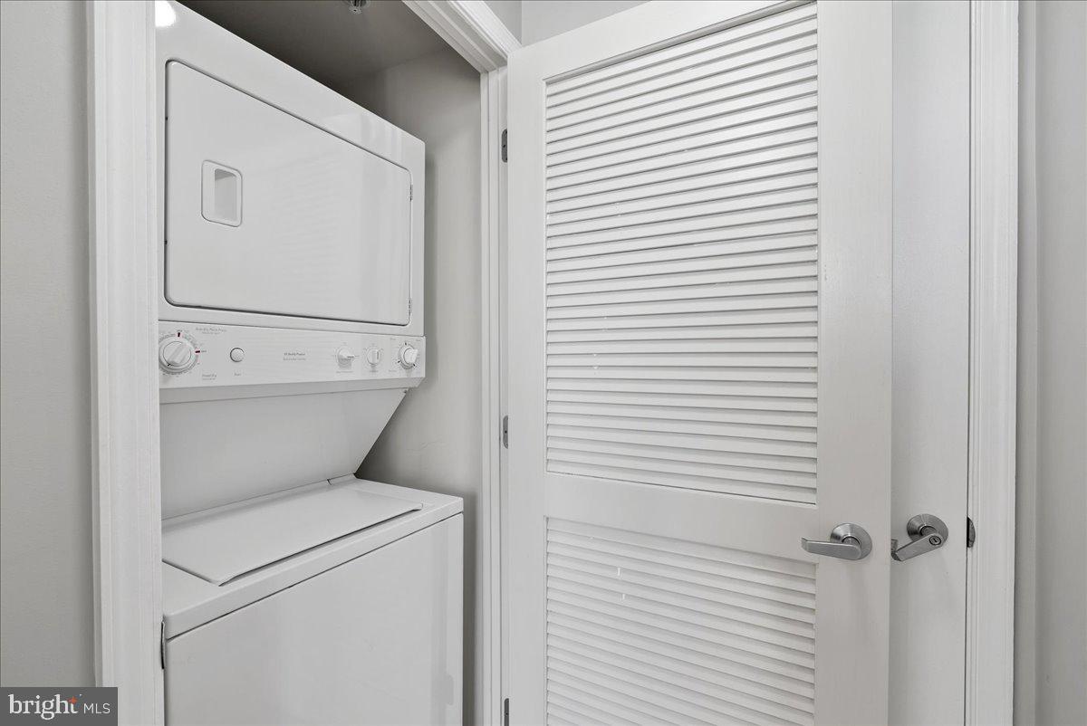 11760 Sunrise Valley Drive, Unit 909 Reston, VA 20191 - Photo 15 of 20 a utility room with dryer and washer