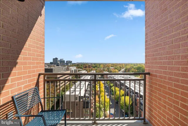 a view of balcony with furniture
