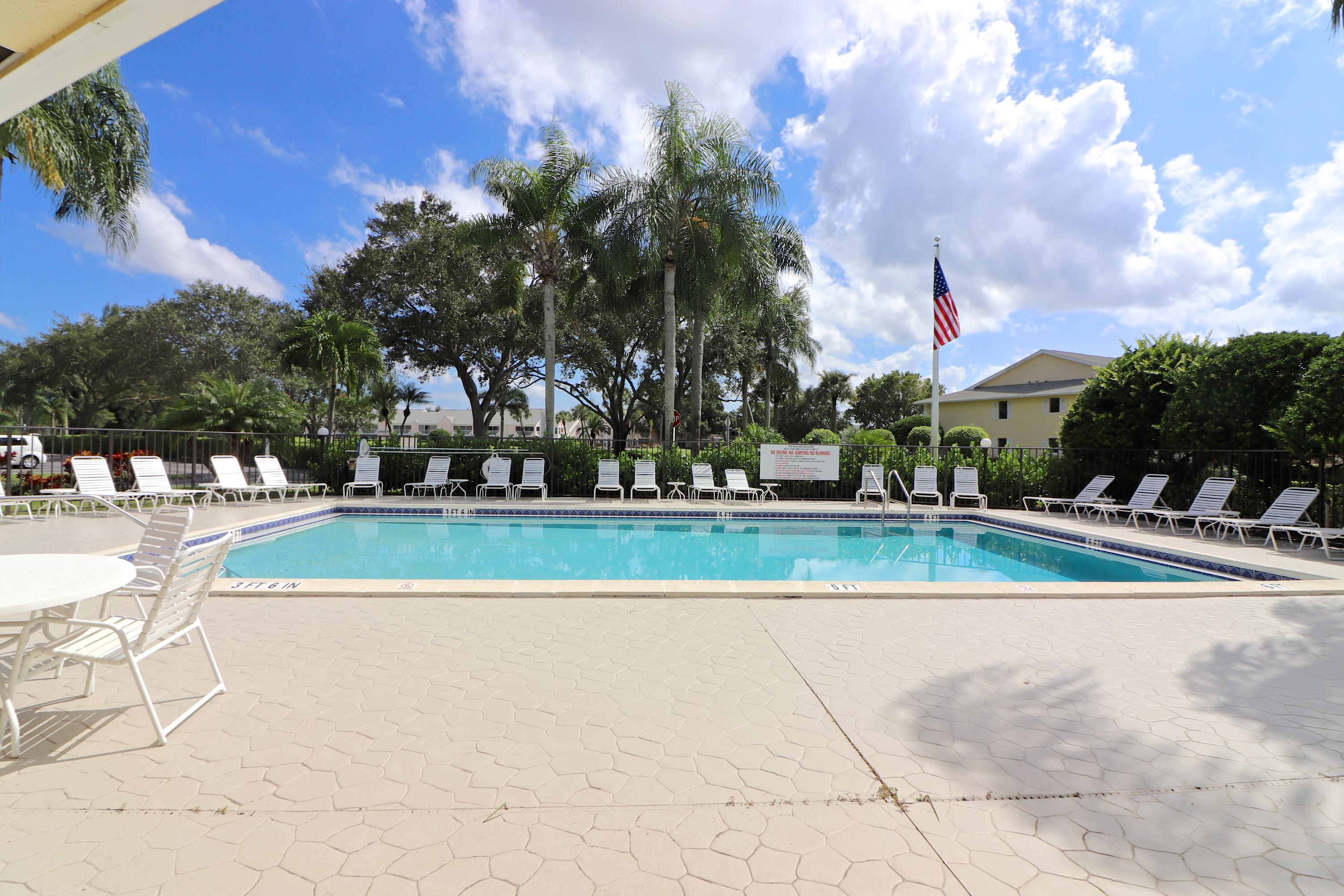1112 Keystone Drive, Unit C Jupiter, FL 33458 - Photo 27 of 34 Community Pool