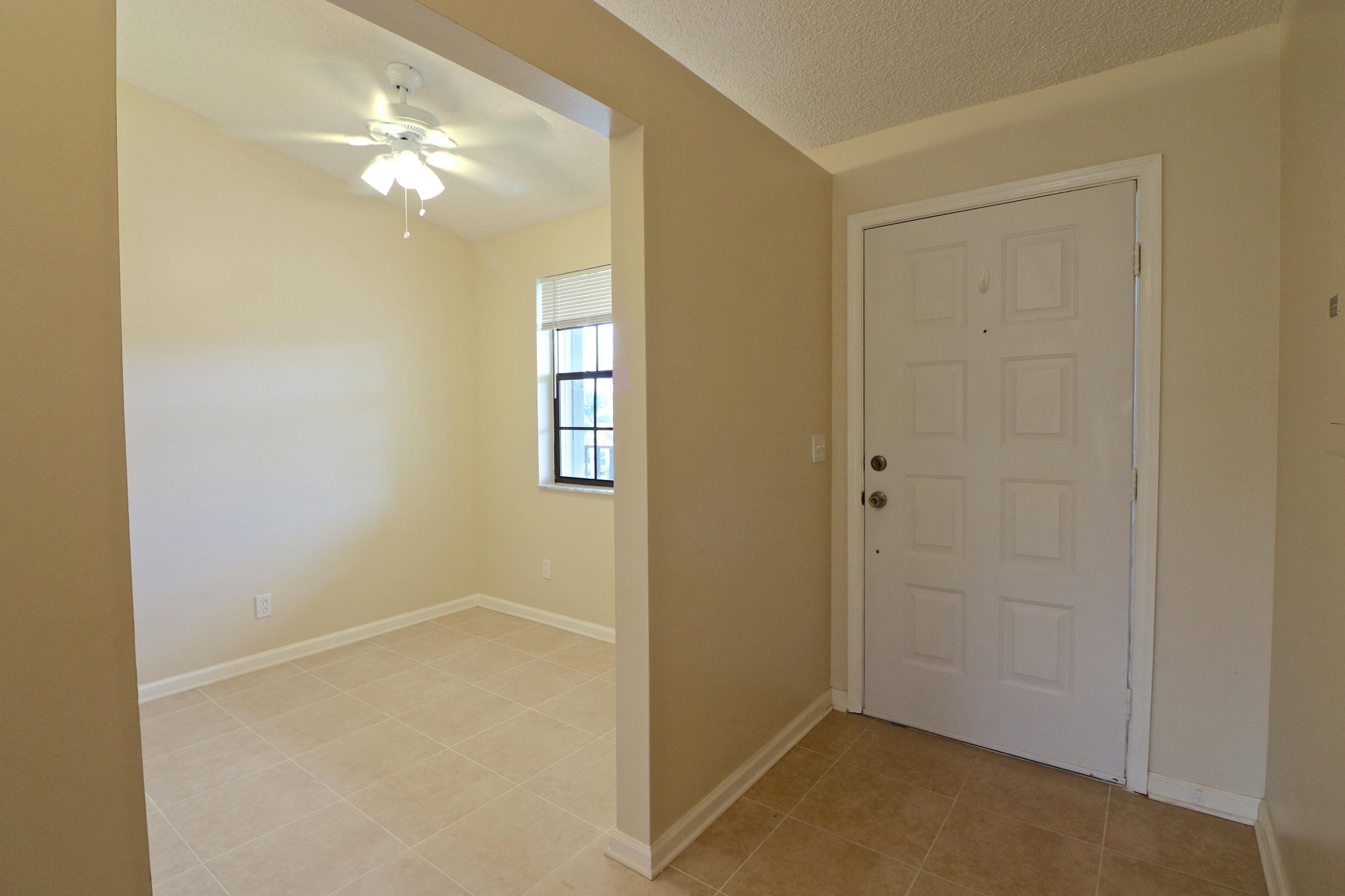 1112 Keystone Drive, Unit C Jupiter, FL 33458 - Photo 5 of 34 Foyer