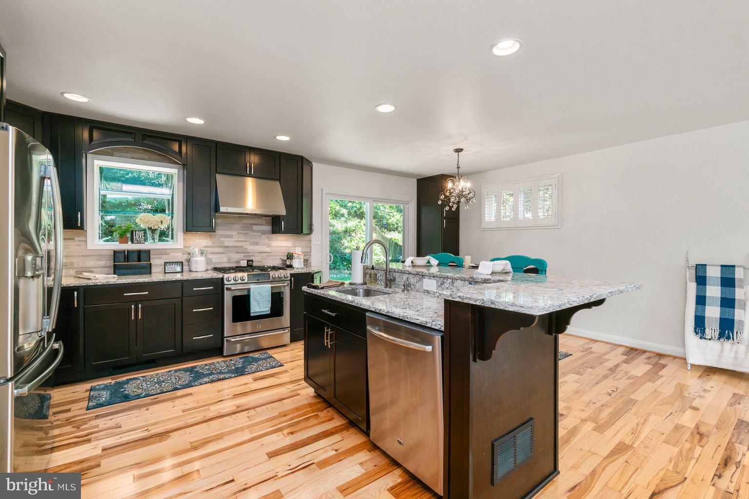 2014 Rollingwood Road Baltimore, MD 21228 - Photo 12 of 40 S/S appliances, recessed lighting + corner pantry