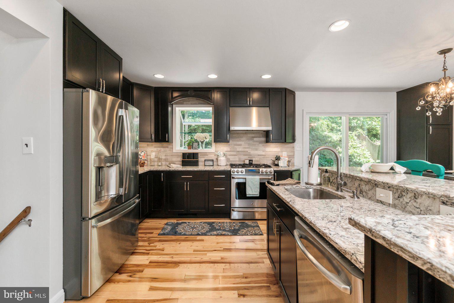 2014 Rollingwood Road Baltimore, MD 21228 - Photo 18 of 40 NOTE: garden window next to sink + SS range hood