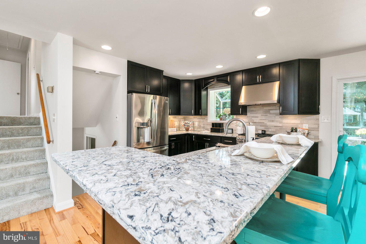 2014 Rollingwood Road Baltimore, MD 21228 - Photo 21 of 40 Granite countertops throughout kitchen .