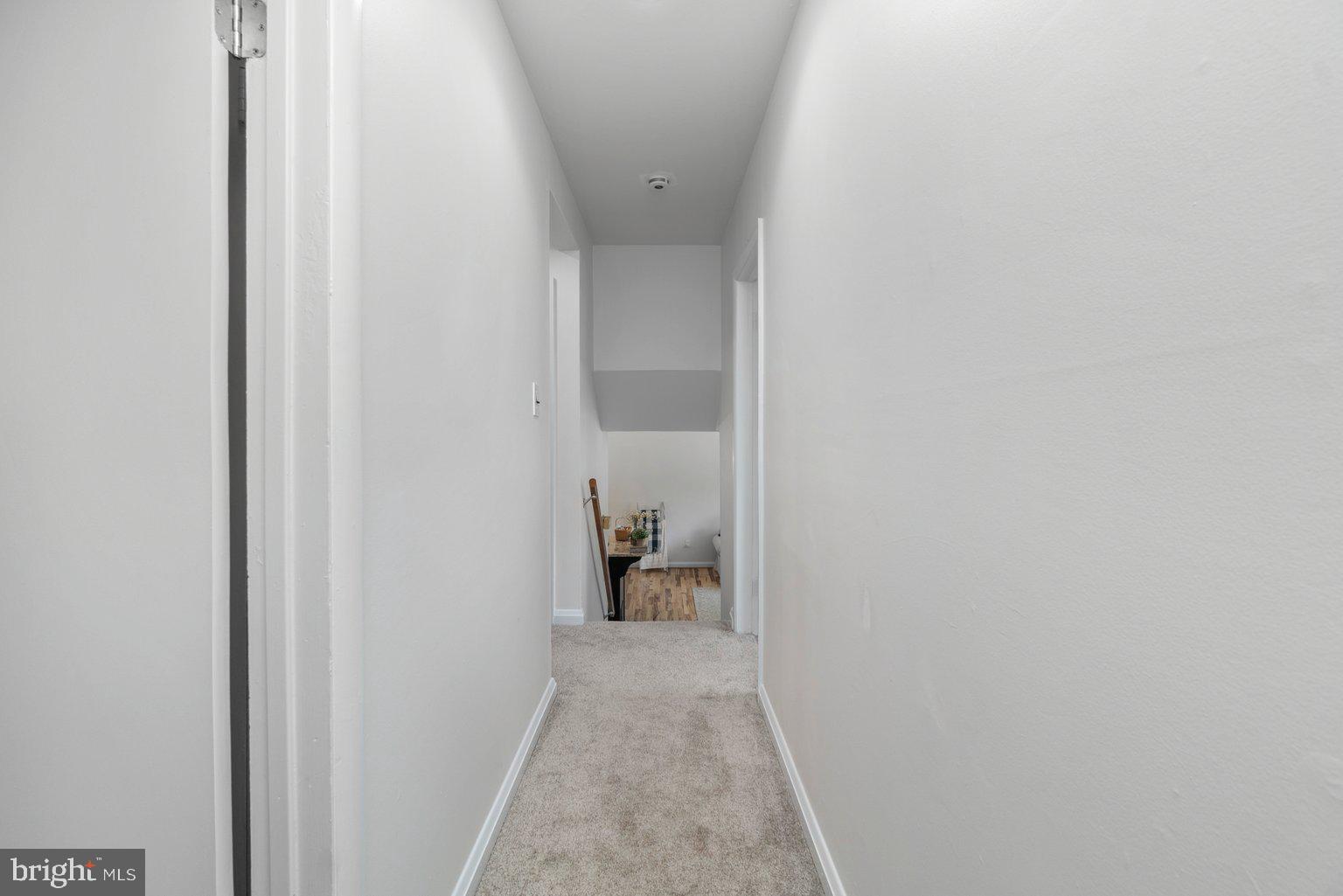 2014 Rollingwood Road Baltimore, MD 21228 - Photo 32 of 40 Freshly carpeted hallway