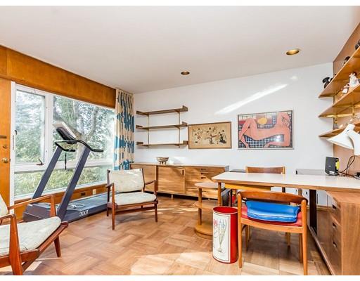 44 Mignon Road Newton, MA 02465 - Photo 11 of 23 a living room with furniture pool table and a floor to ceiling window