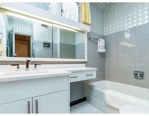 44 Mignon Road Newton, MA 02465 - Photo 12 of 23 a bathroom with a sink and a bathtub