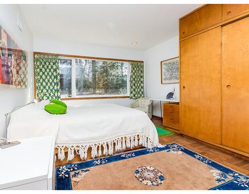 44 Mignon Road Newton, MA 02465 - Photo 15 of 23 a bed sitting in a bedroom next to a window