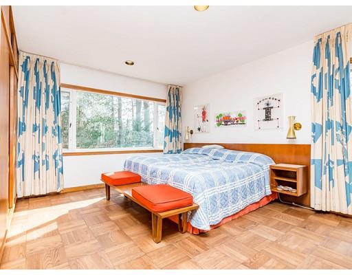 44 Mignon Road Newton, MA 02465 - Photo 10 of 23 a spacious bedroom with a bed and a large window