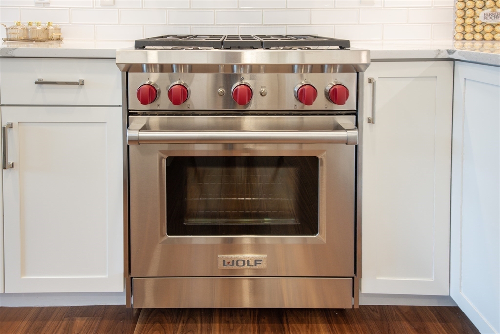 3531 Washington Street, Unit 316 Boston, MA 02130 - Photo 13 of 40 a utility room with washer and dryer
