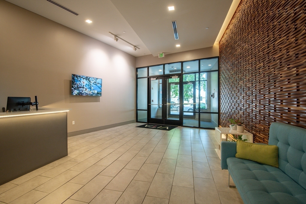 3531 Washington Street, Unit 316 Boston, MA 02130 - Photo 3 of 40 a view of an empty room with a window