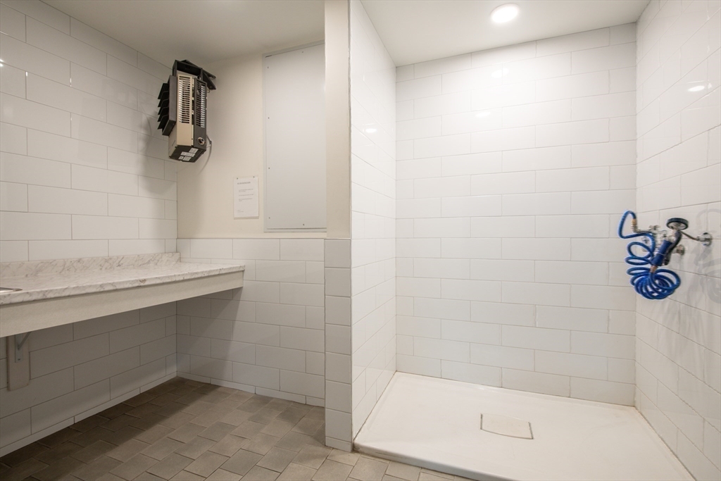 3531 Washington Street, Unit 316 Boston, MA 02130 - Photo 32 of 40 a bathroom with a shower