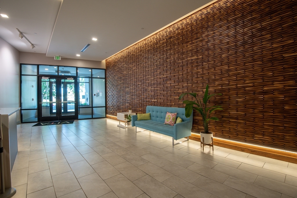 3531 Washington Street, Unit 316 Boston, MA 02130 - Photo 34 of 40 a lobby with furniture