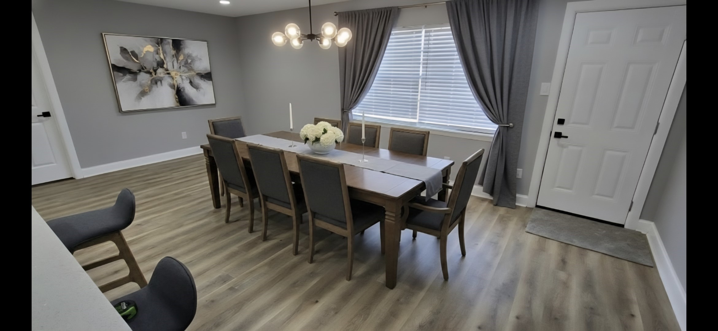 6502 Trail Valley Way Houston, TX 77086 - Photo 13 of 24 a view of a dining room with furniture and wooden floor