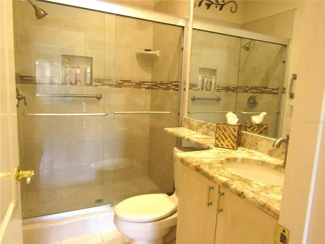 a bathroom with a sink and a shower