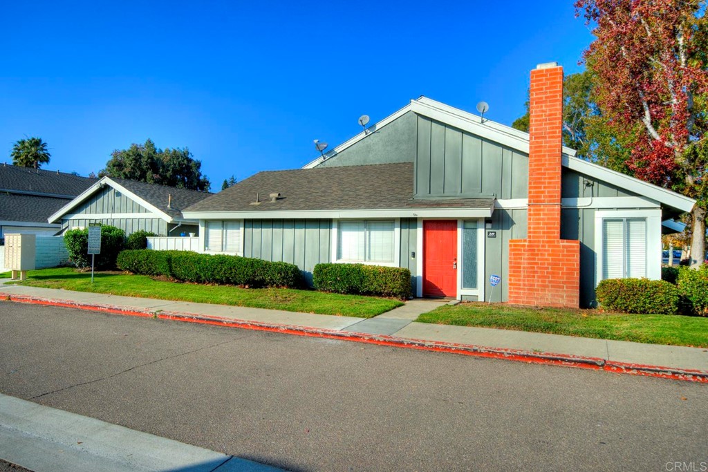 249 Fredricks Avenue Oceanside, CA 92058 - Photo 25 of 31 a front view of house with yard and green space