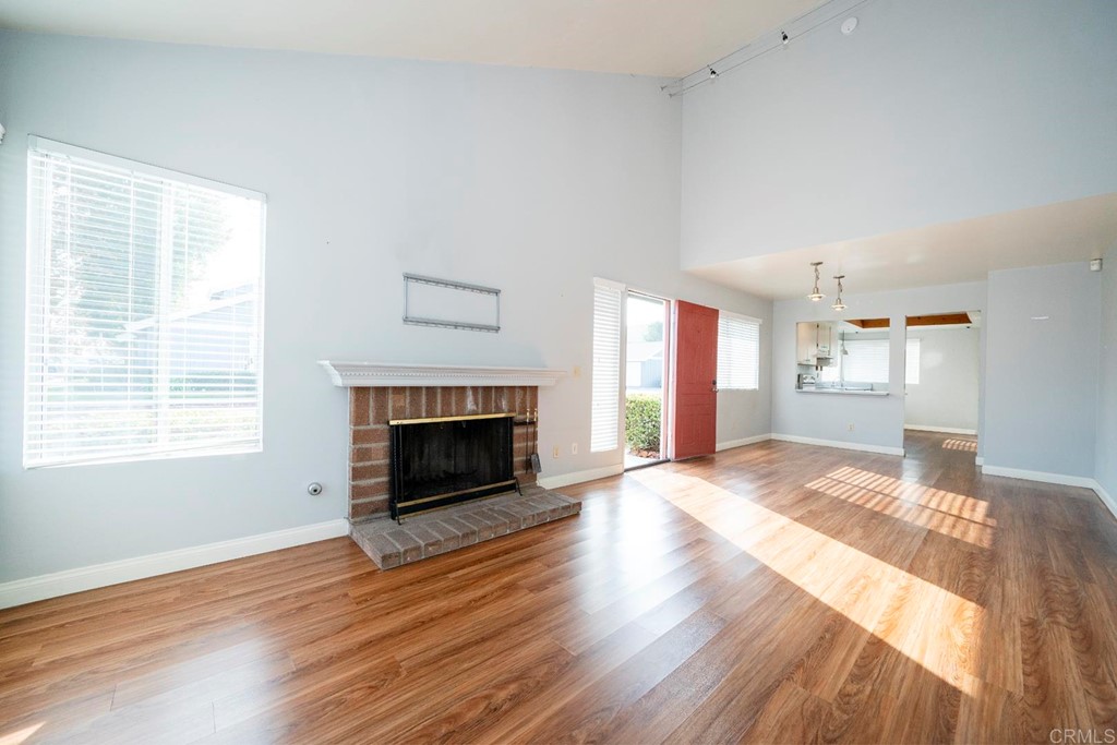 249 Fredricks Avenue Oceanside, CA 92058 - Photo 6 of 31 a view of an empty room with window and fire place